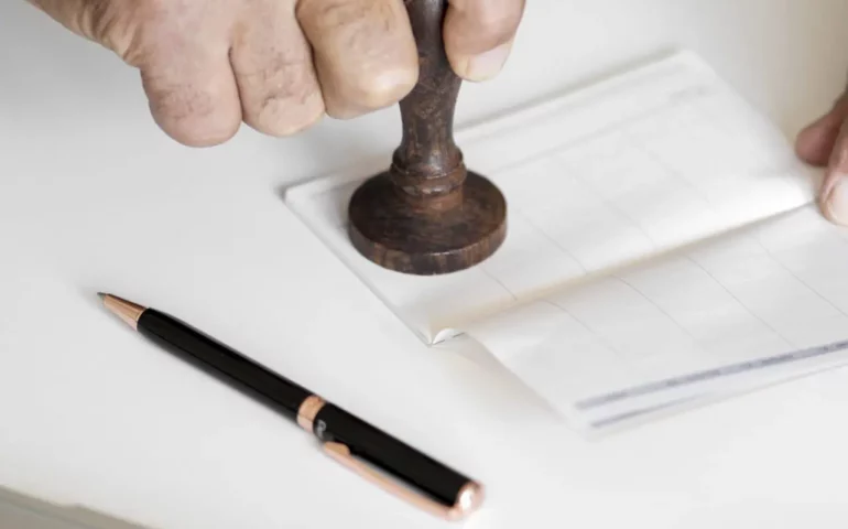 People checking bankbook isolated on white table